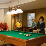 fox run residents playing billiards
